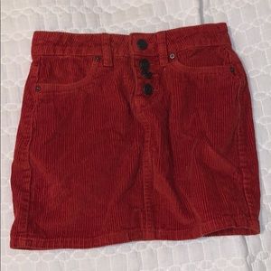 Red velvet skirt.